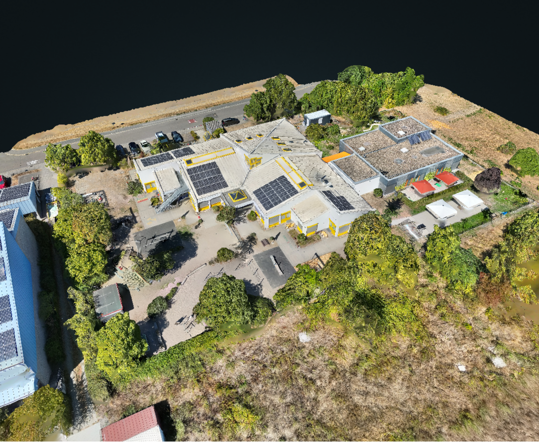 Photogrammetrisches 3D-Modell eines Gebäudekomplexes, erstellt aus Drohnenbildern